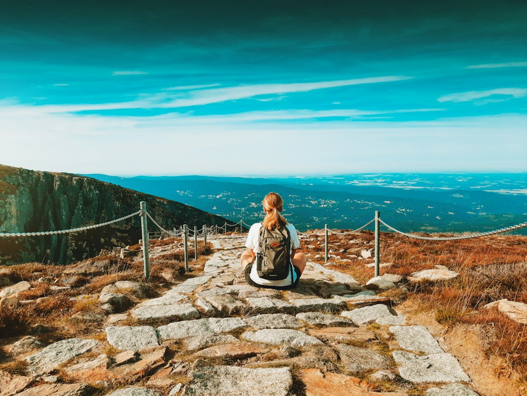 person meditating in nature