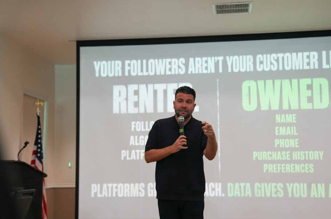 man speaking in conference